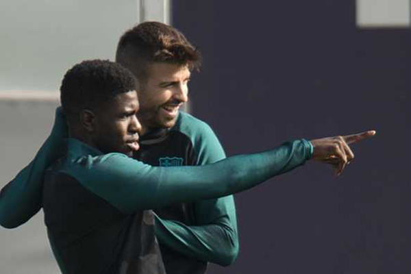 Gerard Pique berharap Umtiti Bertahan di Barcelona